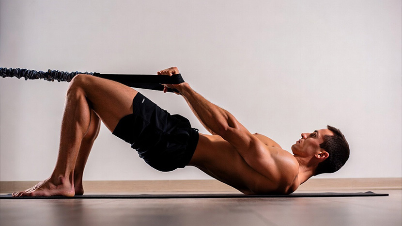 What is T-Bench Glute Bridge Fly?